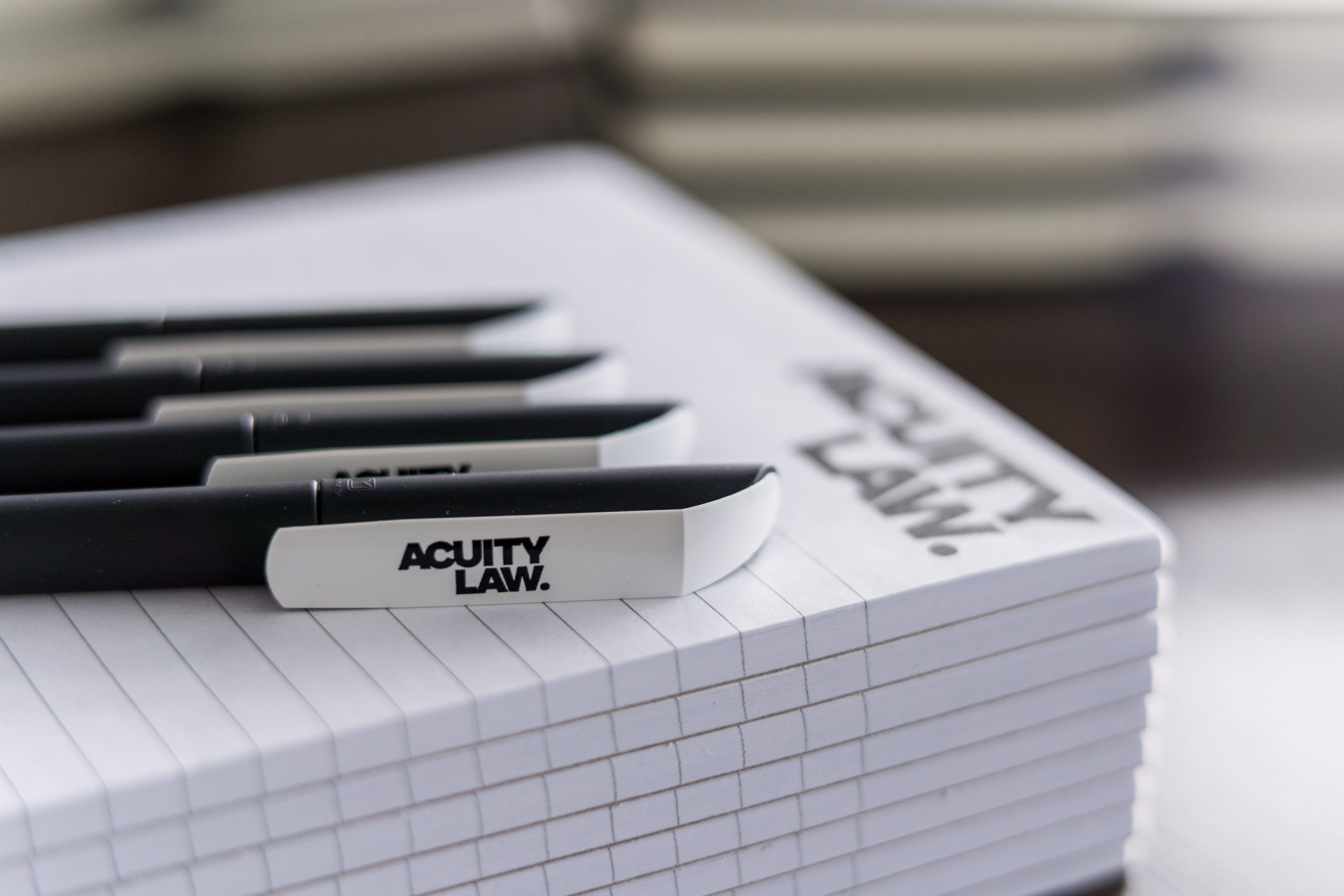 Acuity Law pens and notebooks