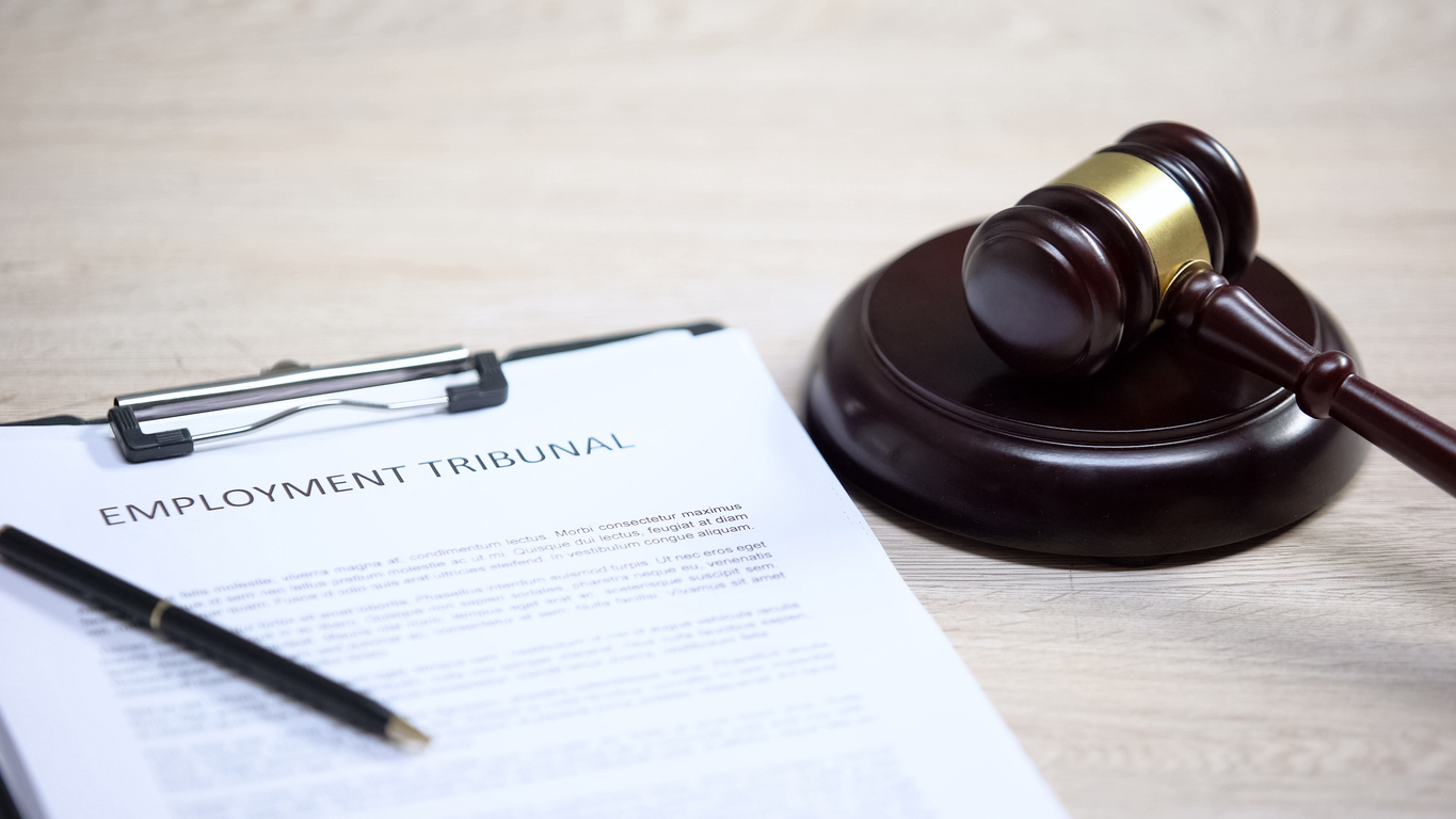Employment tribunal document and gavel